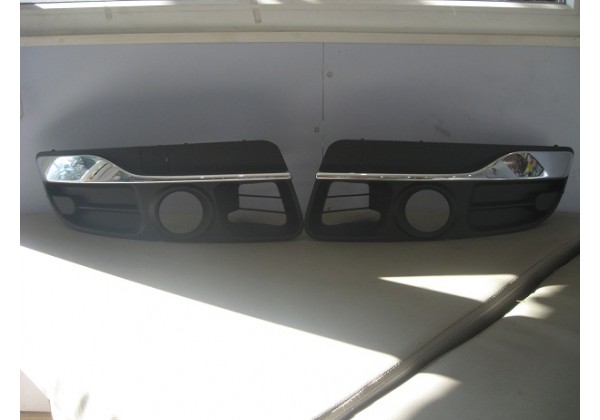 Заглушка ліва , (решітка) протитуманних фар бампера переднього  Renault Laguna III, 620102560R